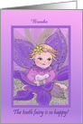 The tooth fairy is so happy! Adorable girl tooth fairy holding tooth card