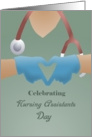 Celebrating Nursing Assistants Day with gloves, scrubs, stethoscope card