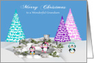 Christmas to Grandson, adorable penguins on ice and snow with trees card