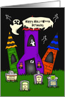 Birthday on Halloween with a Spooky House and Humorous Tombstones card