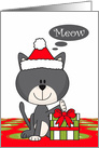 Christmas with a Gray Cat Wearing a Santa Hat Touching a Present card
