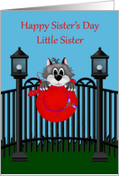 Sister’s Day to Little Sister, Cat on fence with red hat, light posts card