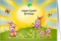 Birthday on Easter with Bunnies Holding Decorated Eggs in a Meadow card