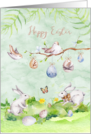 Easter with a Bird Perched on a Branch and Two Rabbits in The Grass card