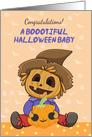 New baby born on halloween, with cute pumpkin card