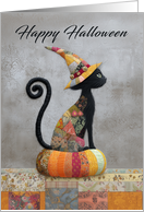 Halloween Black Cat Sitting on a Patchwork Pumpkin With Witches Hat card