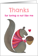 Cute Squirrel in a Red and Pink Patterned Sweater Loving a Nut card