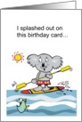 Cartoon showing koala bear using paddle board with happy fish. card