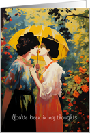 Two Women Stand Under a Yellow Umbrella in Anticipation of a Kiss card