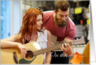 Man and Woman Playing Guitar First Wedding Anniversary card