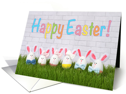 Egg bunnies in a row on grass Happy Easter card (1563838)