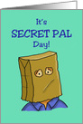 Secret Pal Day Card with a Cartoon Person Wearing a Bag On Their Head card