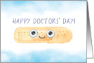Happy Doctors’ Day With Smiling Bandaid on Watercolor Background card
