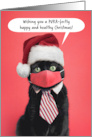 Merry Christmas Cat in Face Mask and Santa Hat Humor card