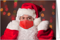 Merry Christmas Santa Claus Putting Face Mask on Humor card