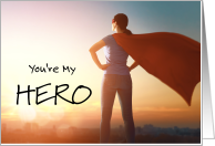 Female Hero Overlooking City at Sunset card