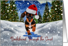 Christmas Dachshund Puppy Dog Running Through the Snow Santa Hat card