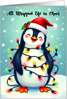 Funny Christmas Penguin Tangled in Lights with Santa Hat card